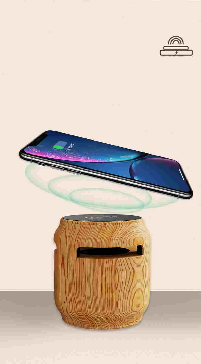 Wood grain wireless Bluetooth speaker with built-in wireless charger on a desk, 80x75x75mm plastic cabinet