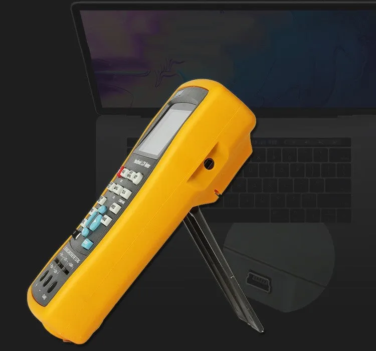 ET432 handheld LCR digital bridge with 2.8 inch TFT LCD screen and Kelvin test clamp on bench