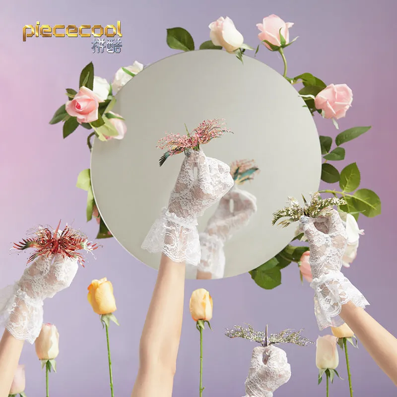 Flower Crane metal puzzle kit in colour box, showing assembled crane model with LED light