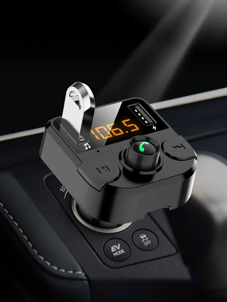 Black BT36B Bluetooth car MP3 player with FM transmitter and 1.1-inch display, connected to a car cigarette lighter.