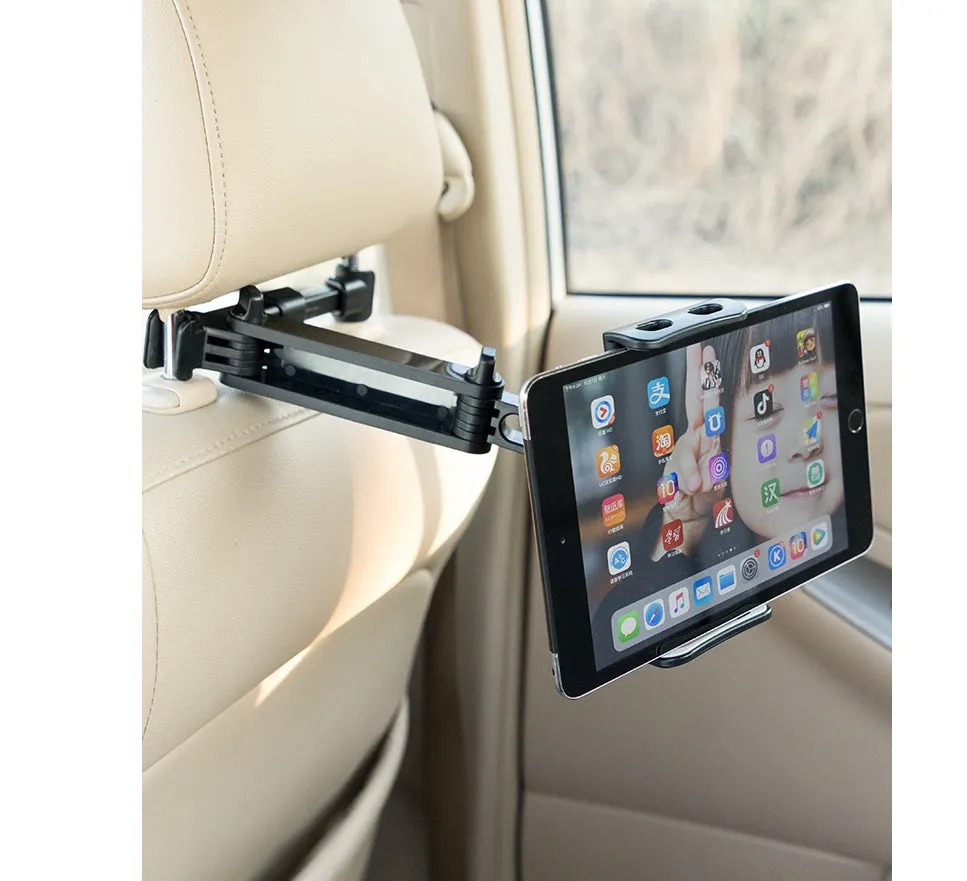 Black car phone holder mounted to rear seat base holding tablet for navigation