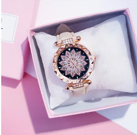 Women's diamond dial watch with round 32mm case in multiple colour options showing water resistance