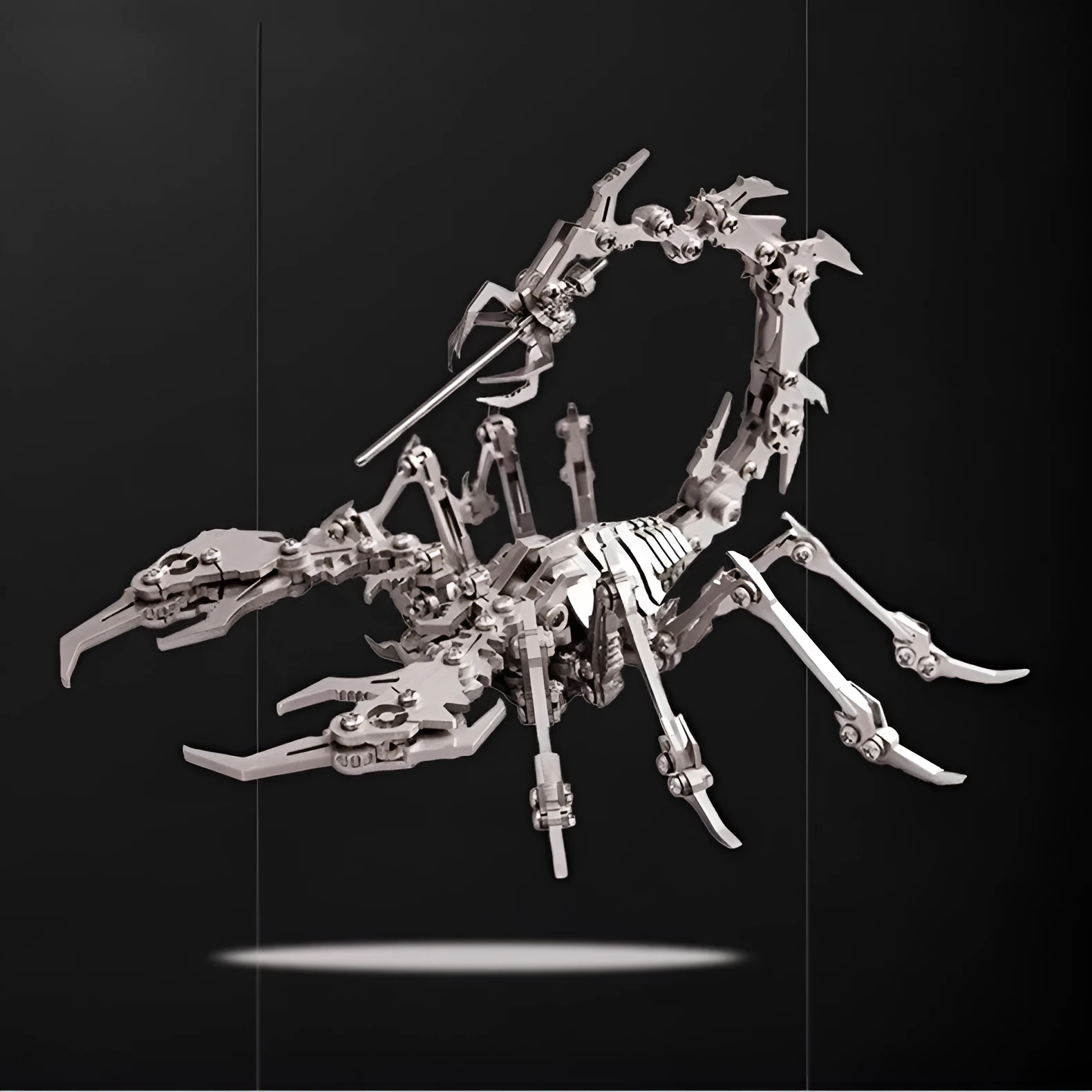 Blue Magic metal scorpion 3D puzzle model assembled on table next to colour box packaging