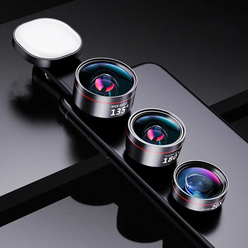 Universal smartphone clip with attached fill light and selection of wide angle, macro, and fish eye camera lenses.