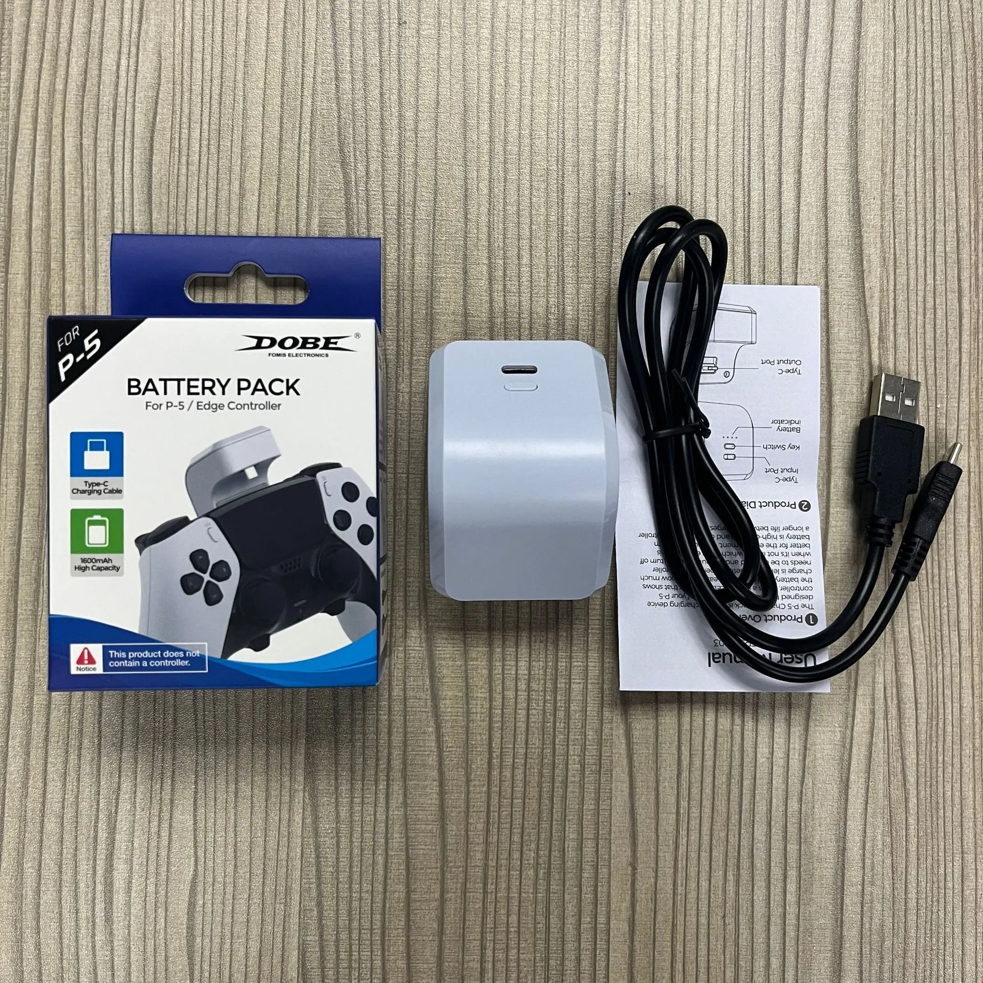 White ABS PS5 handle power bank with Type-C port and LED indicator, attached to a PS5 controller
