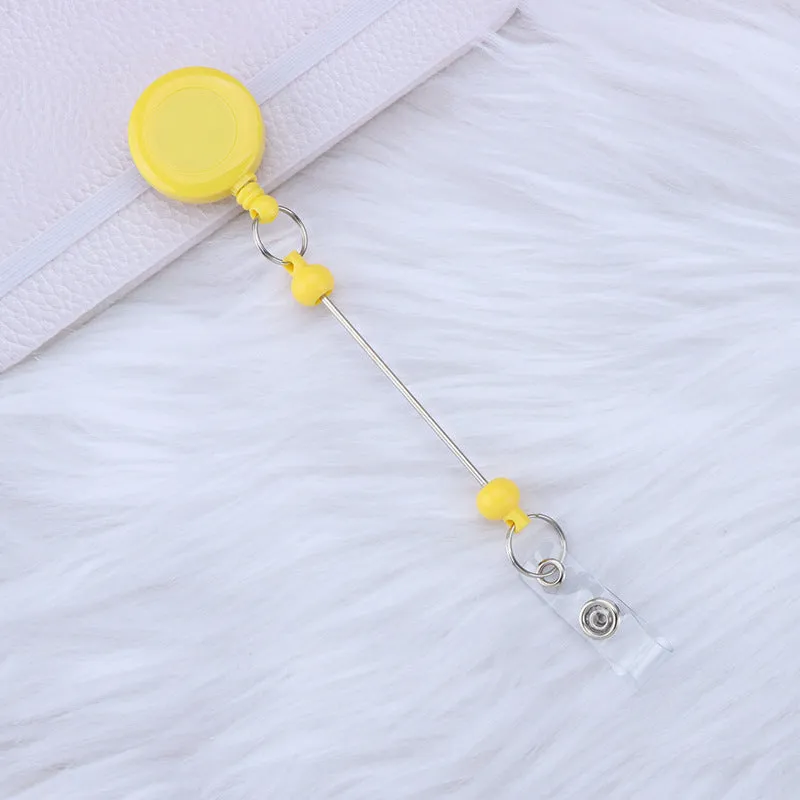 Plastic telescopic retractable keychain with anti-lost buckle, 16.6cm x 3.2cm, available in multiple colours