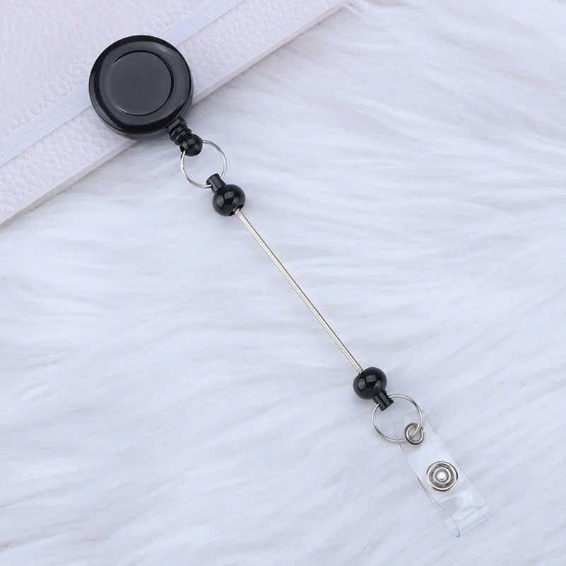 Plastic telescopic retractable keychain with anti-lost buckle, 16.6cm x 3.2cm, available in multiple colours