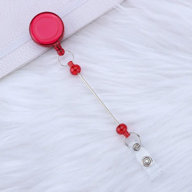 Plastic telescopic retractable keychain with anti-lost buckle, 16.6cm x 3.2cm, available in multiple colours