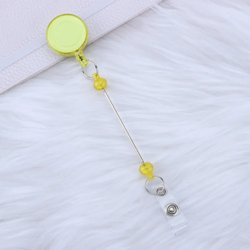 Plastic telescopic retractable keychain with anti-lost buckle, 16.6cm x 3.2cm, available in multiple colours