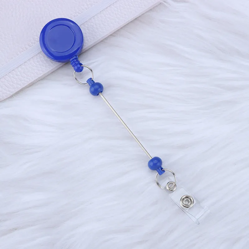 Plastic telescopic retractable keychain with anti-lost buckle, 16.6cm x 3.2cm, available in multiple colours