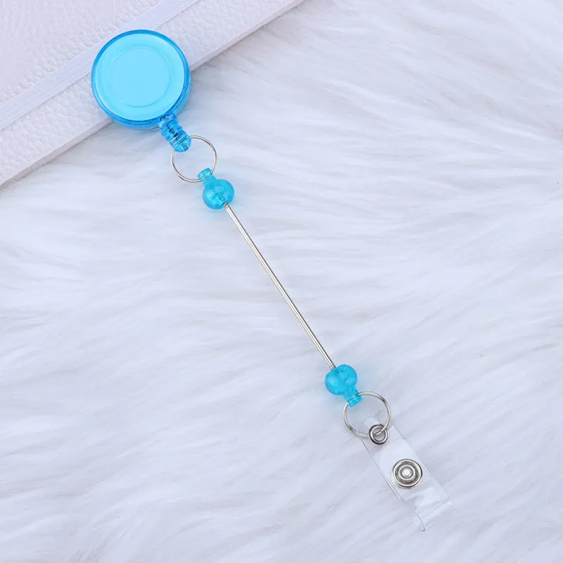 Plastic telescopic retractable keychain with anti-lost buckle, 16.6cm x 3.2cm, available in multiple colours