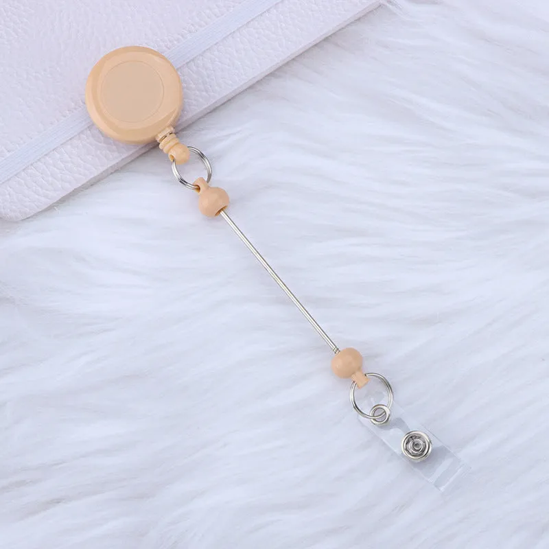 Plastic telescopic retractable keychain with anti-lost buckle, 16.6cm x 3.2cm, available in multiple colours