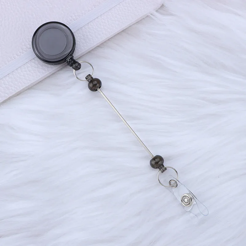 Plastic telescopic retractable keychain with anti-lost buckle, 16.6cm x 3.2cm, available in multiple colours