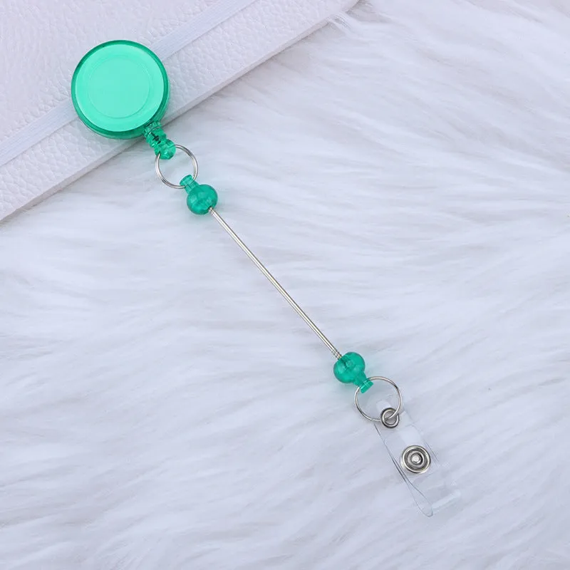 Plastic telescopic retractable keychain with anti-lost buckle, 16.6cm x 3.2cm, available in multiple colours