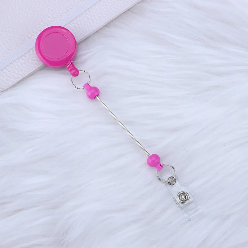 Plastic telescopic retractable keychain with anti-lost buckle, 16.6cm x 3.2cm, available in multiple colours