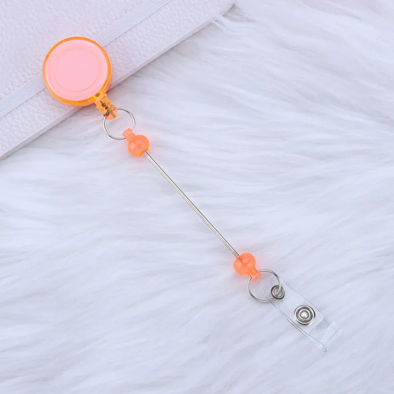 Plastic telescopic retractable keychain with anti-lost buckle, 16.6cm x 3.2cm, available in multiple colours