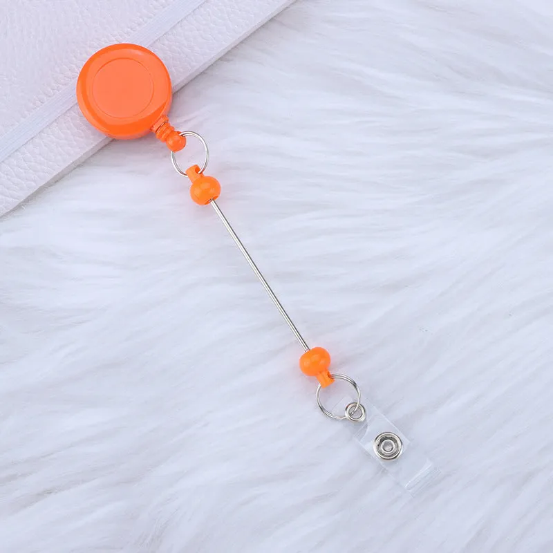 Plastic telescopic retractable keychain with anti-lost buckle, 16.6cm x 3.2cm, available in multiple colours