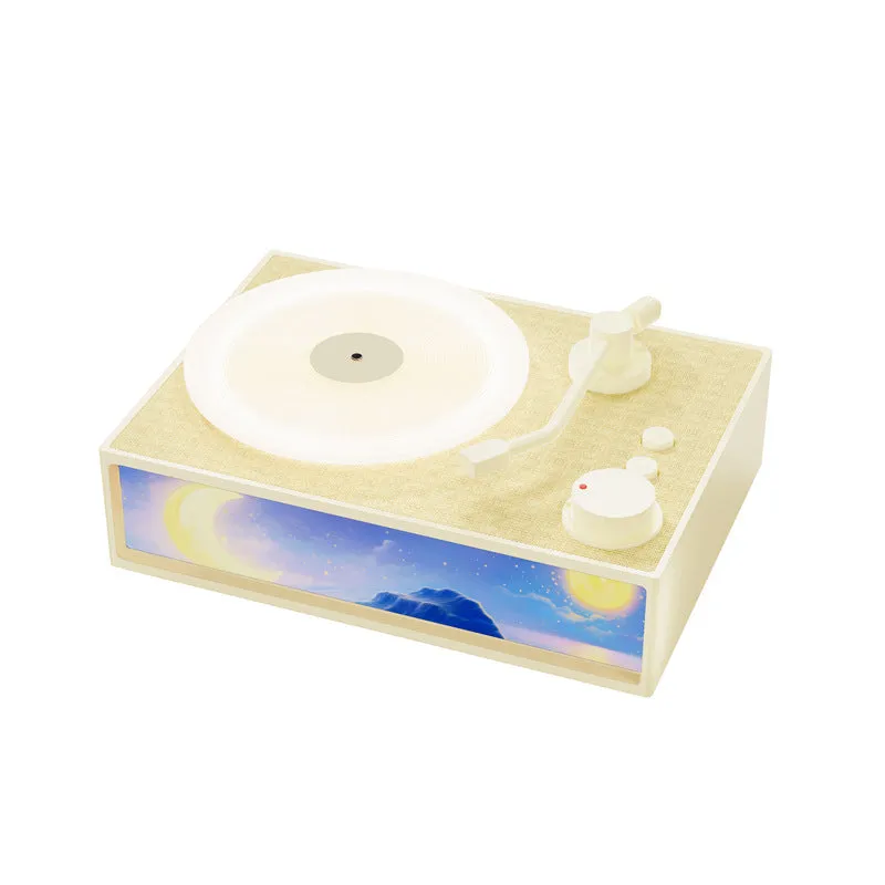 Light Painting Aromatherapy Bluetooth Speaker in elegant white with plastic casing and lighting effects on desktop