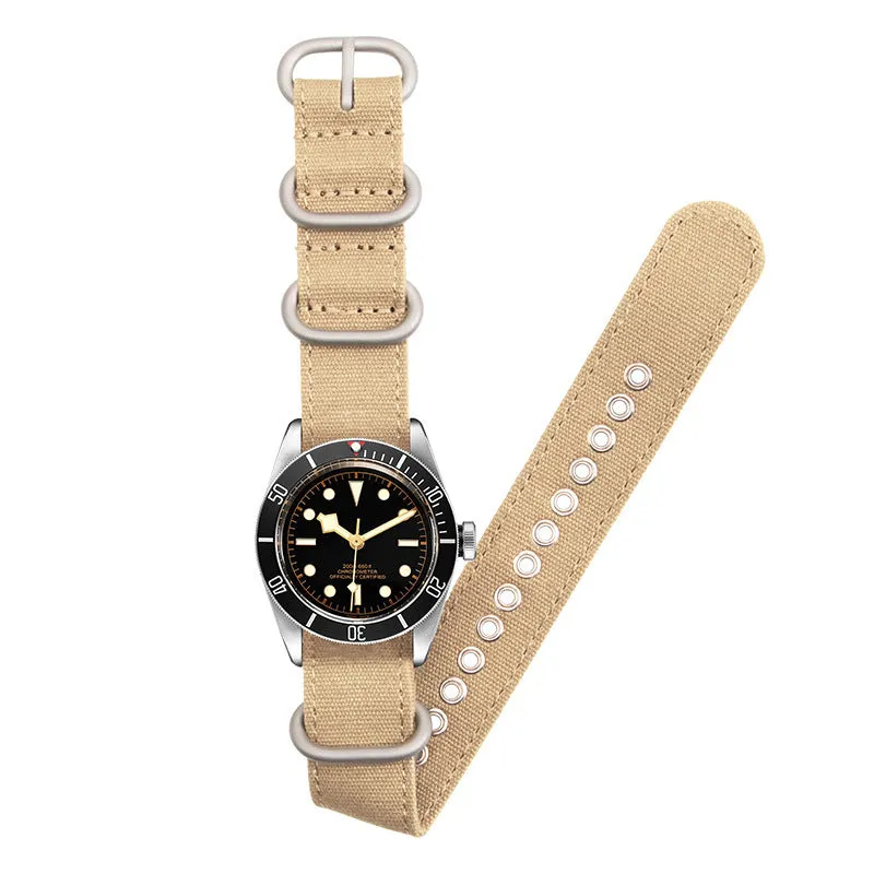 Canvas nylon thickened watch band in army green with silver buckle on a wrist