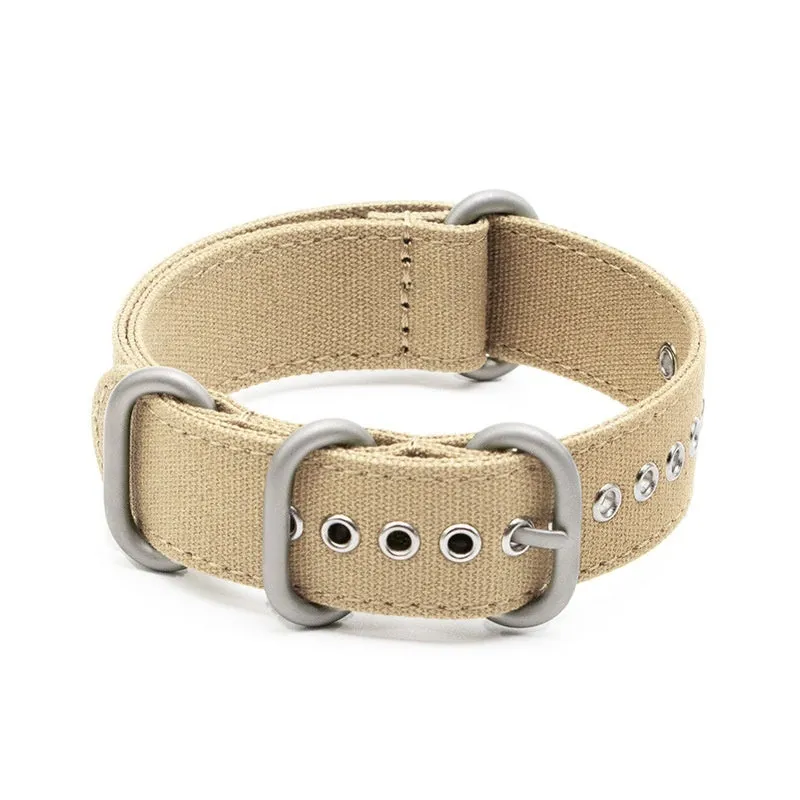 Canvas nylon thickened watch band in army green with silver buckle on a wrist