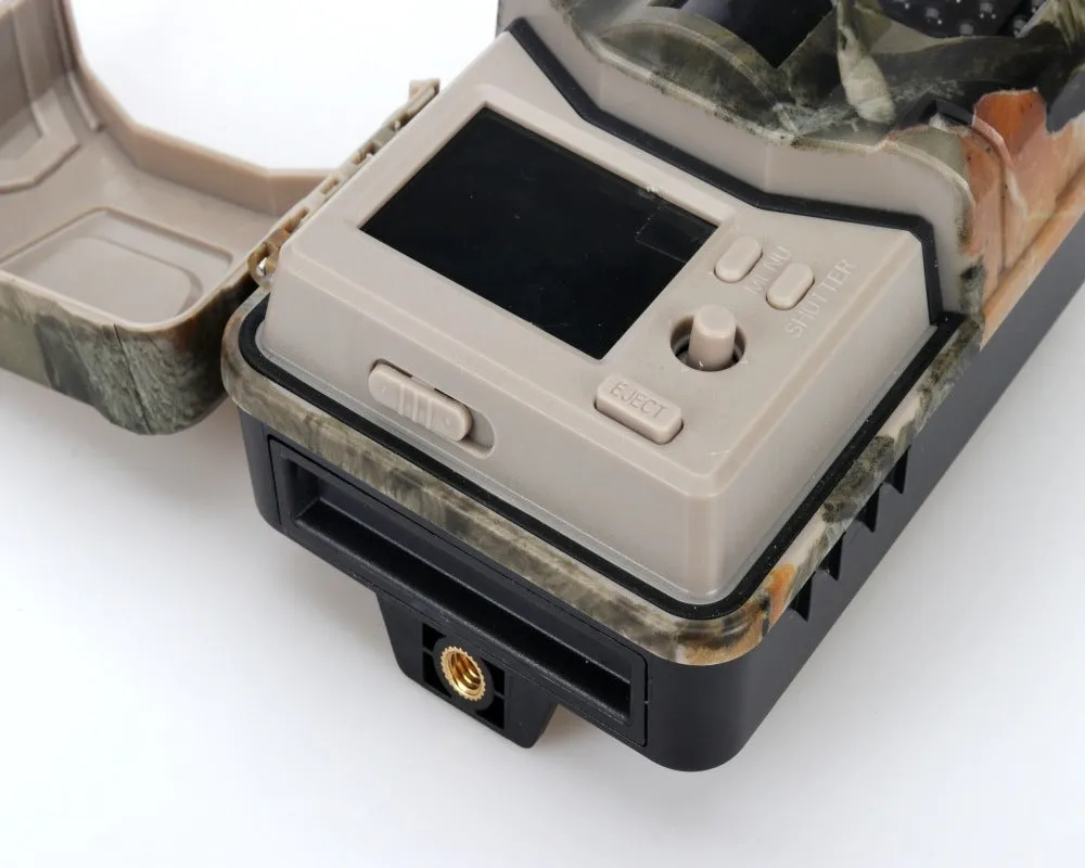 Compact camouflage infrared hunting camera with Bluetooth for mobile APP connectivity.