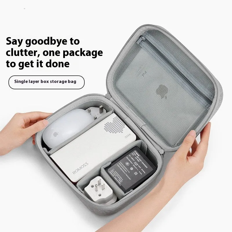 Gray multifunctional digital storage bag for data cable headset charger made from EVA material with sewing, holding cables and a charger