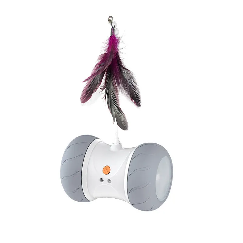 White light grey automatic electric roller tumbler cat toy on floor, ABS plastic construction