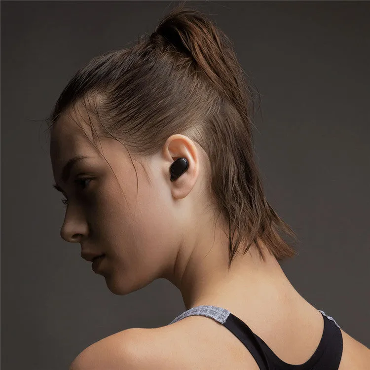 Black Redmi AirDots true wireless Bluetooth earbuds with a charging case.