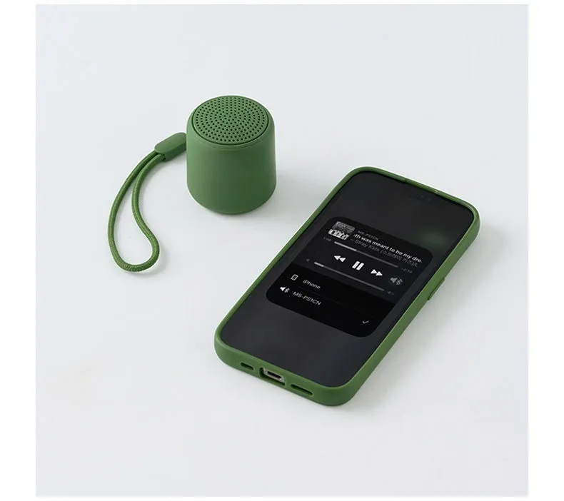Mini portable wireless Bluetooth speaker in black with rounded edges and fabric grille, 45x48mm size