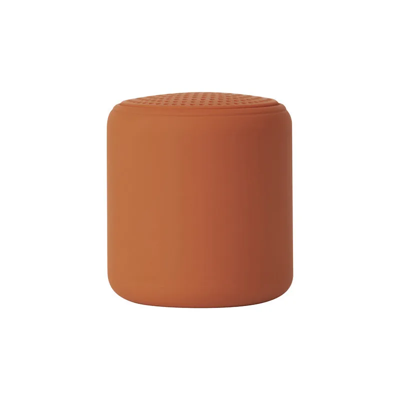 Mini portable wireless Bluetooth speaker in black with rounded edges and fabric grille, 45x48mm size
