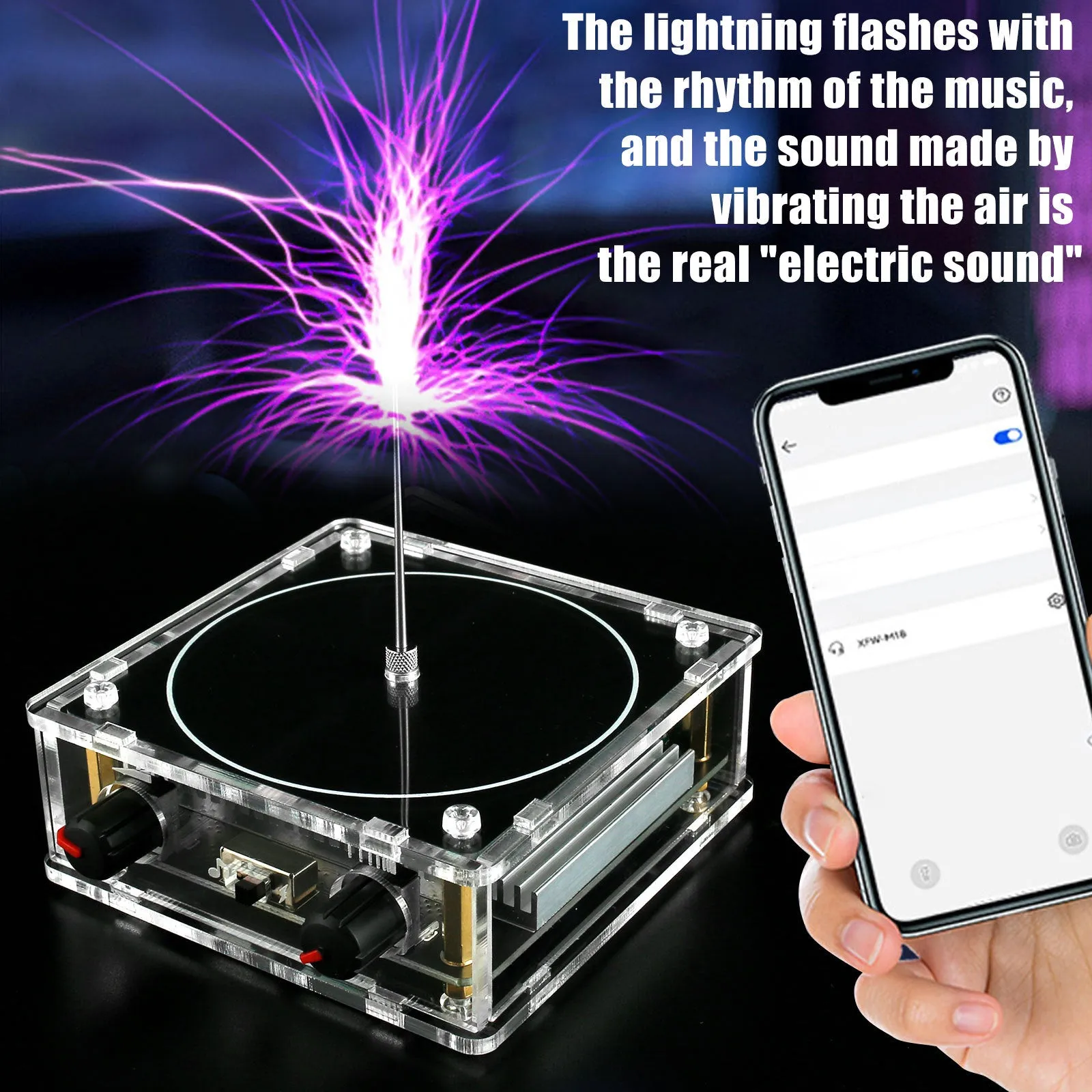 Music tesla coil with touchable arc plasma lightning on a desk next to a power supply