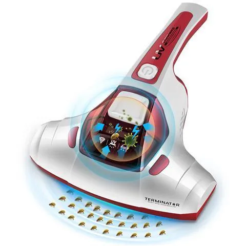 Pink handheld electric vacuum cleaner mite killer artifact on a table.