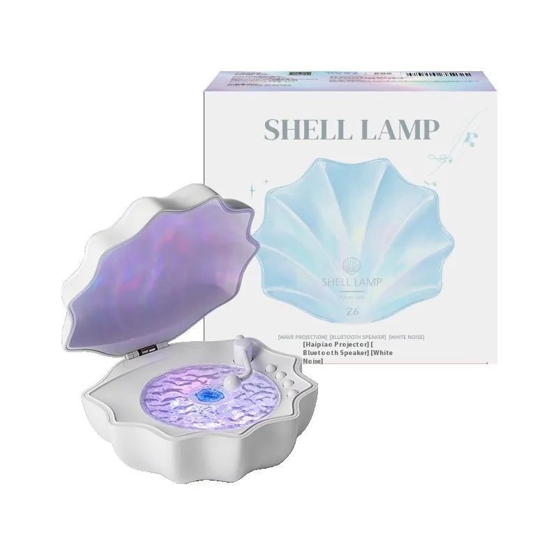 Wireless Bluetooth mini shell light stereo speaker in Aurora Purple with wave light on