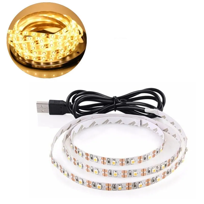 Close-up of a flexible white USB LED light strip with SMD5050 chips and a USB plug.