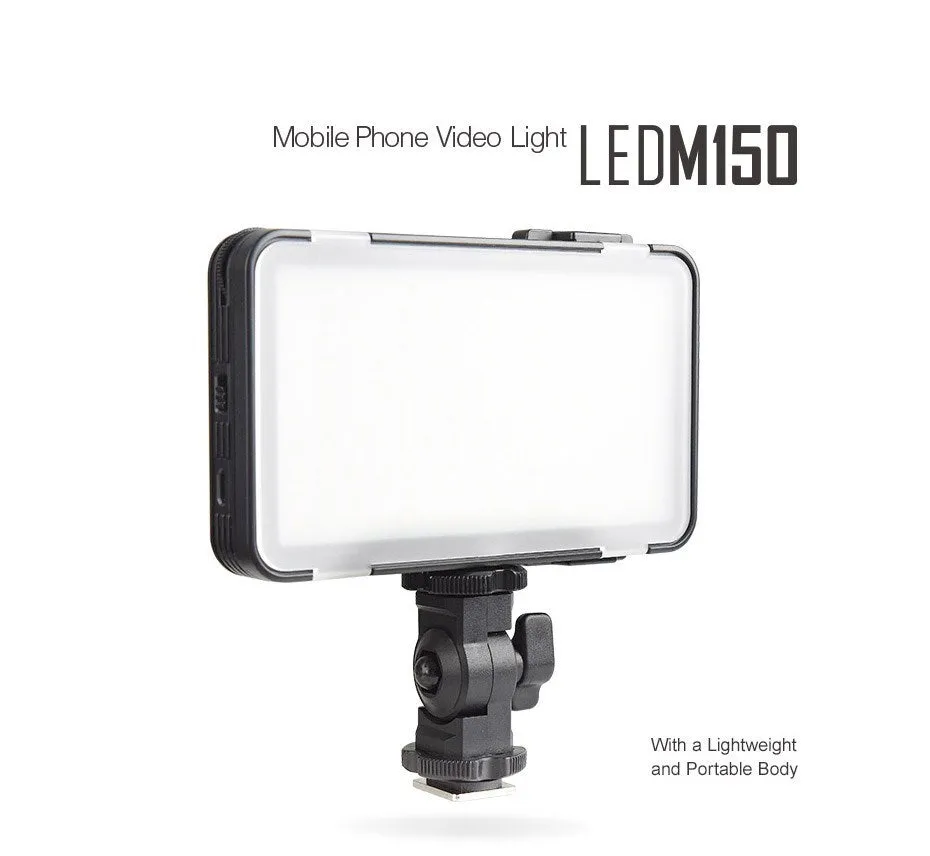 Slim silver Shenniu M150 LED video light with bracket on a mobile phone.