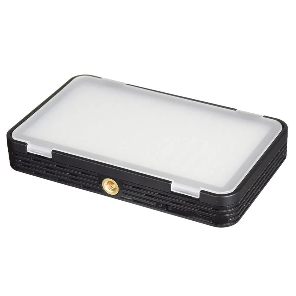 Slim silver Shenniu M150 LED video light with bracket on a mobile phone.