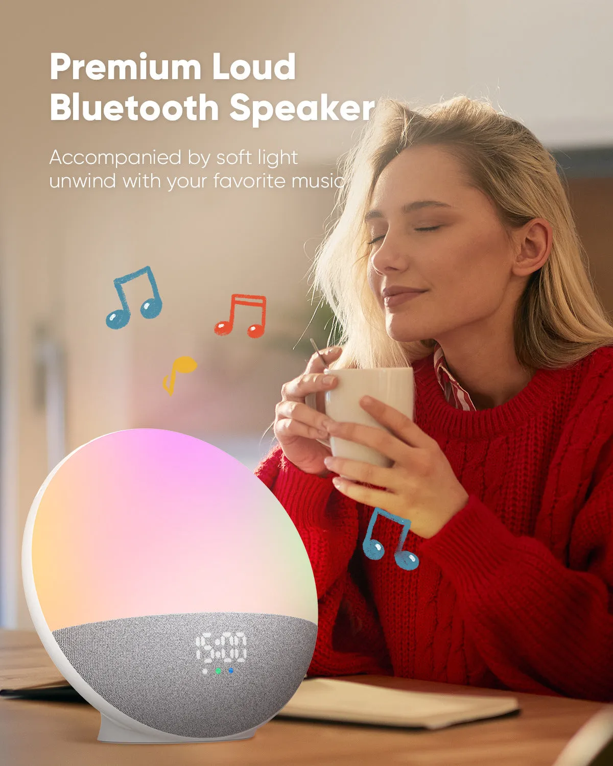 White Bluetooth speaker with RGB colourful luminous lights on a table