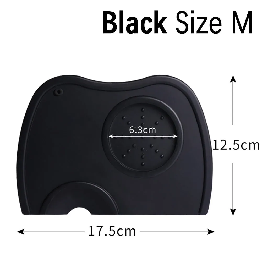 Black silicone coffee tamper pad with stainless steel base for non-slip espresso preparation