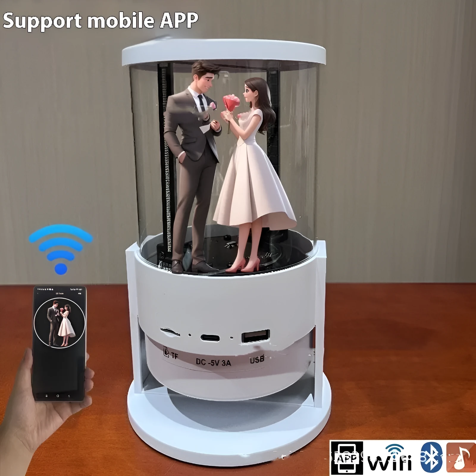 White 360-degree 3D holographic fan Bluetooth speaker with cylindrical screen on a desk