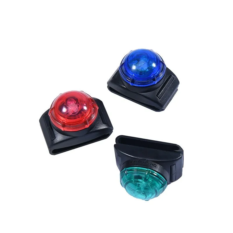 Plastic night anti loss dog walking light in blue attached to a dog collar for evening safety
