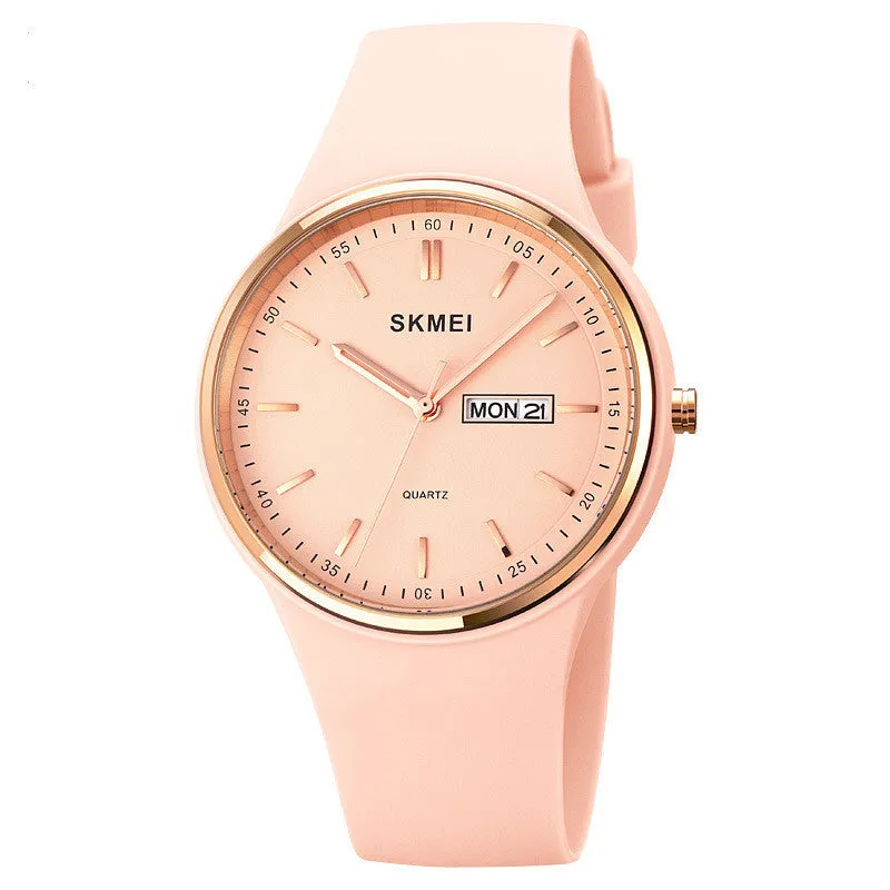 Silicone strap quartz watch for women with a 42mm white dial and calendar display, showing stainless steel pin buckle.