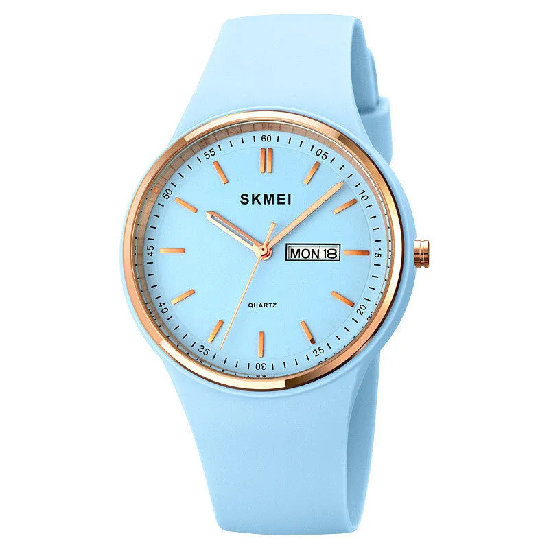Silicone strap quartz watch for women with a 42mm white dial and calendar display, showing stainless steel pin buckle.