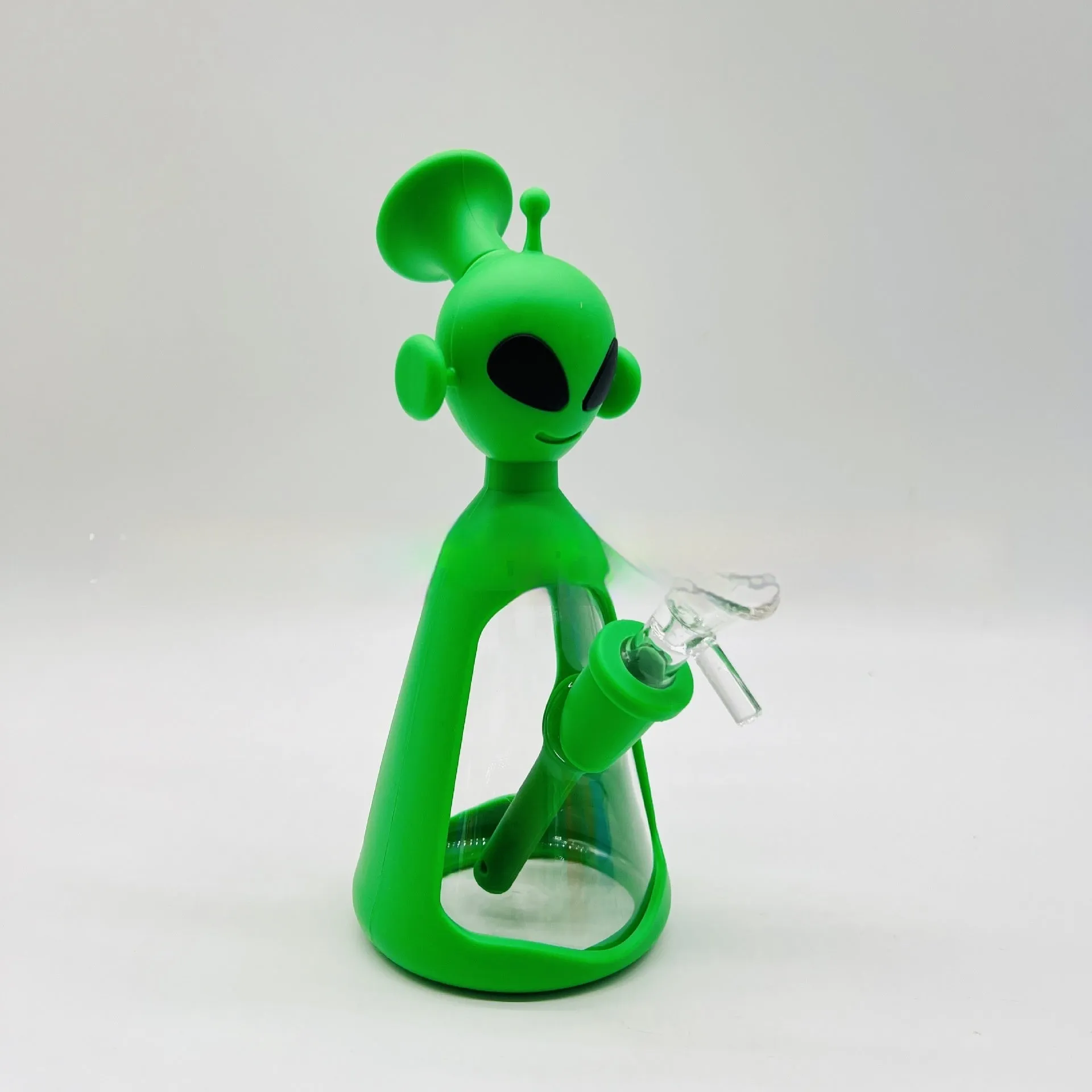 Glass silicone cigarette pipe with clear bowl and blue silicone mouthpiece on white background