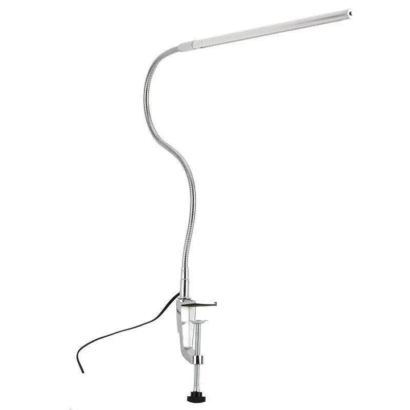 Silver aluminium alloy USB LED nail lamp with long arm and clip-on base, lit with bright white light.
