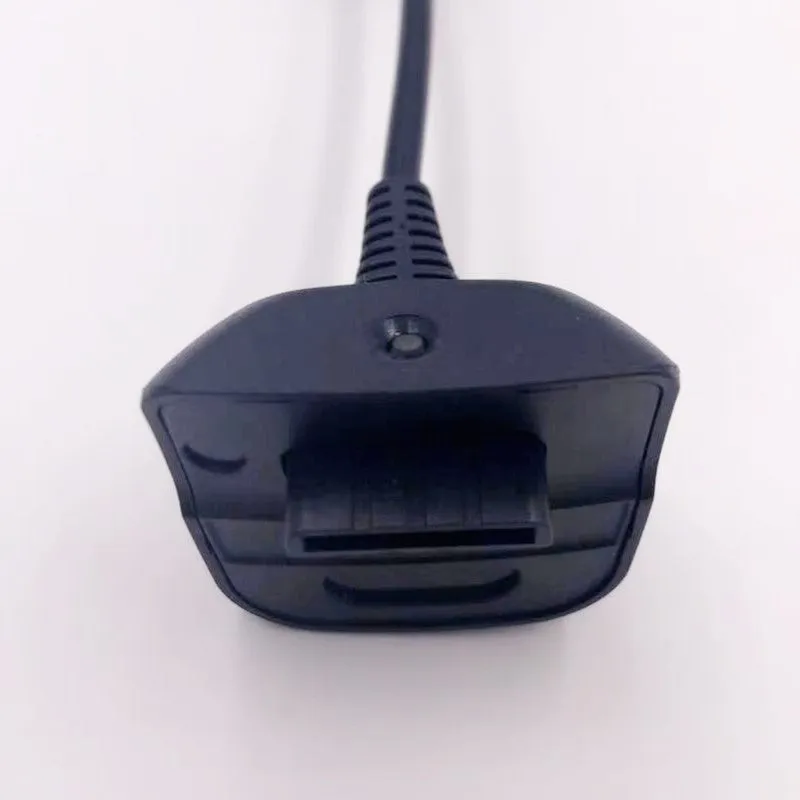 Black Xbox controller charging cable with magnetic ring, 1.5m USB lead on a desk