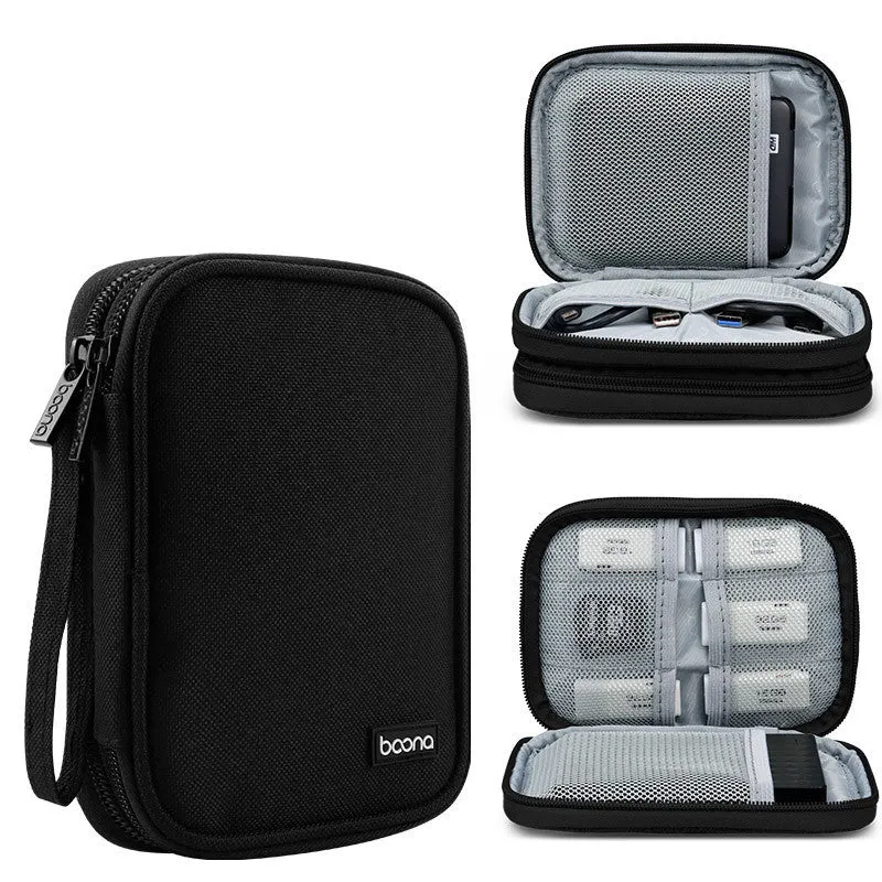 Grey and black Oxford cloth protective storage bags for 2.5-inch portable hard drives on a table.