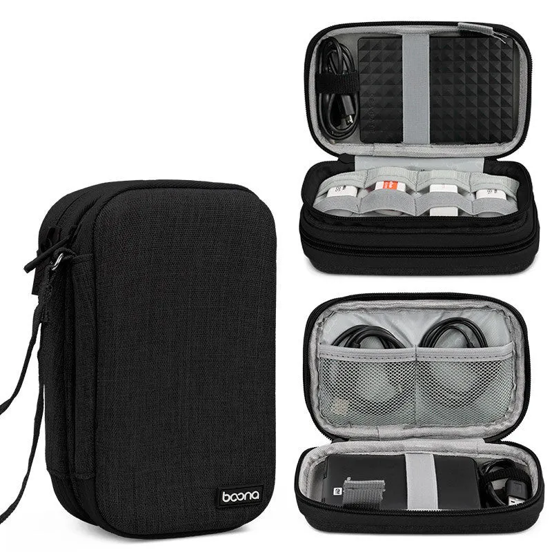 Grey and black Oxford cloth protective storage bags for 2.5-inch portable hard drives on a table.