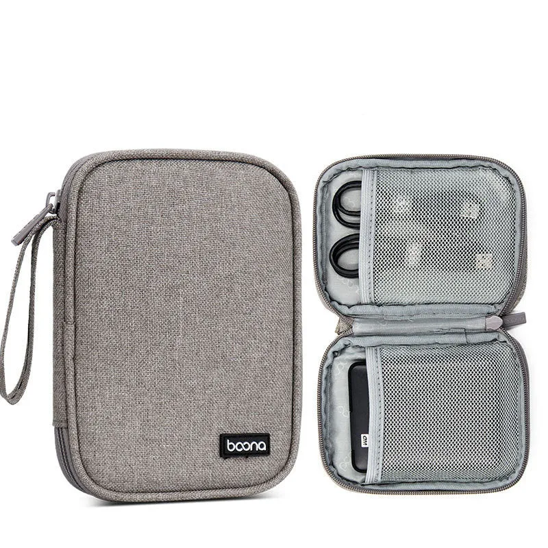 Grey and black Oxford cloth protective storage bags for 2.5-inch portable hard drives on a table.