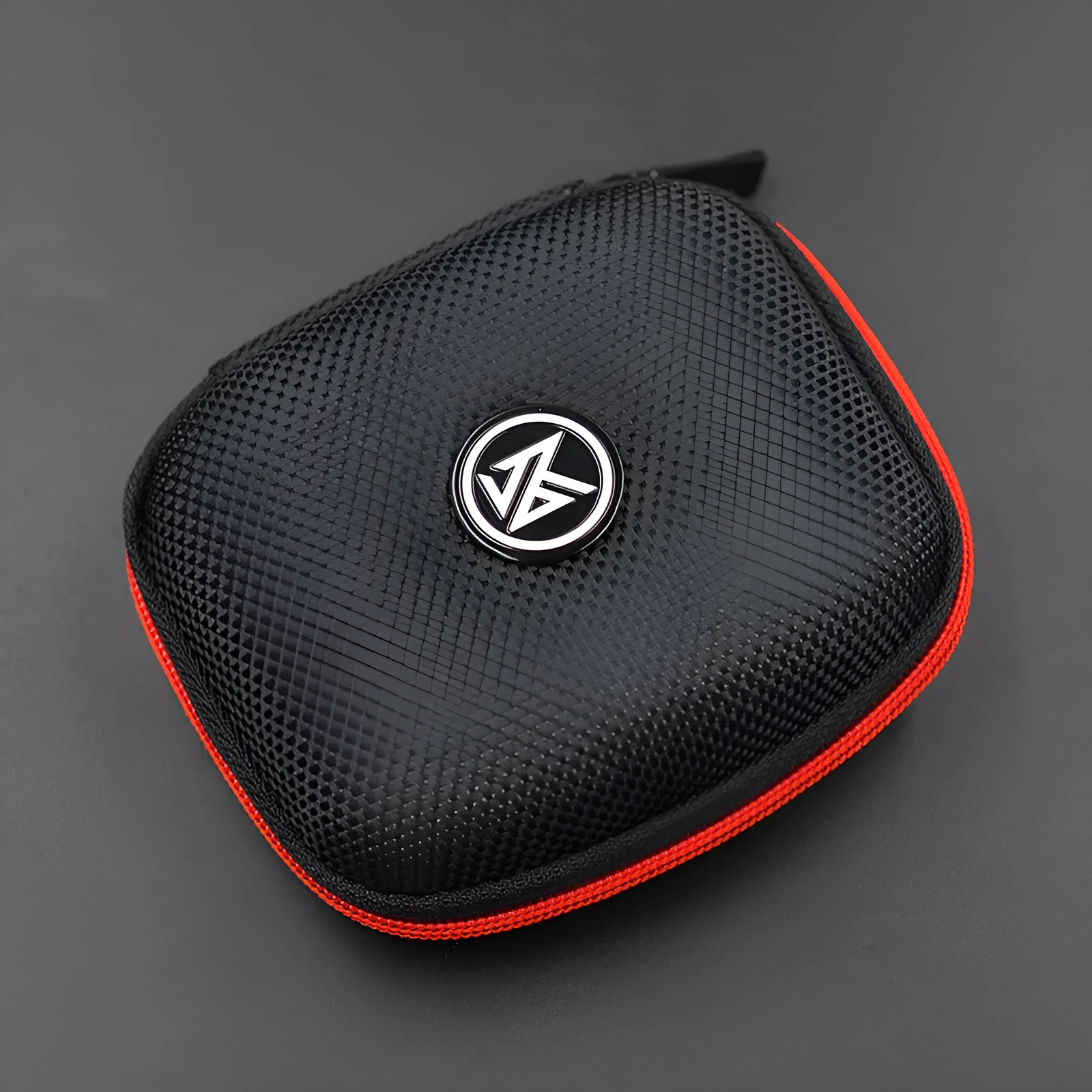 EVA anti-pressure earphone storage bag in black with zipper closure on white background