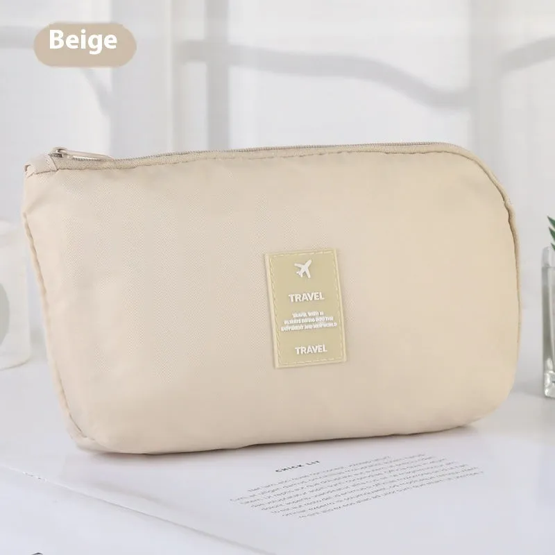 Multi-purpose polyester digital storage bag in beige with zip closure for travel and business use